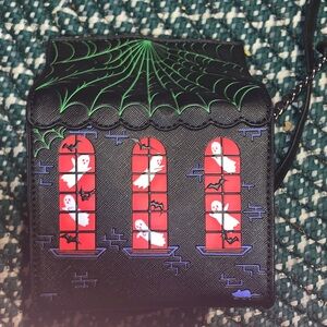 Mad engine haunted house purse